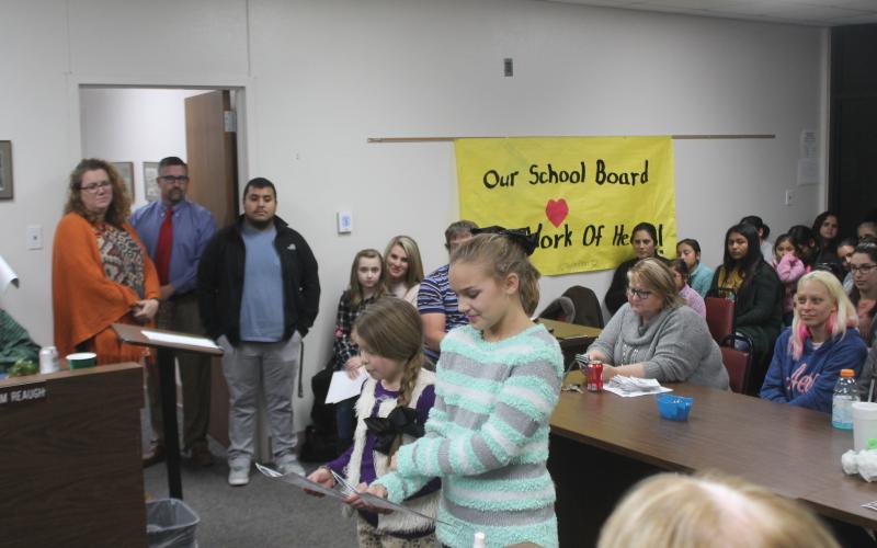 Students from BISD read letters and then give out candy to each board member in honor of School Board Appreciation Month. BA photo by James Norman