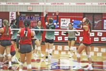 The Lady Bucks celebrate a point scored in the third set of their bi-district loss to Holliday Tuesday, Oct. 31 at Graham High School. Photo/Mike Williams