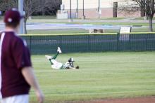 Karter Smalley makes a diving catch in left field early in the Bucks’ 13-4 win Friday, March 29 at Millsap. Photo/Mike Williams