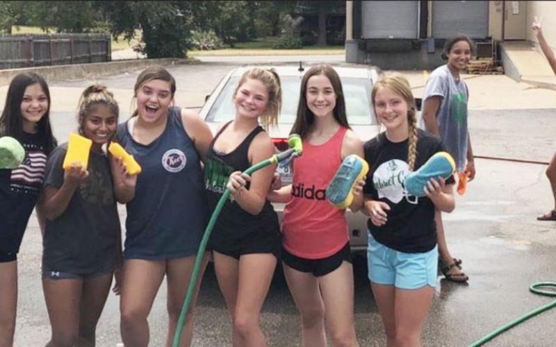 BHS cheerleaders raise over $600 during carwash
