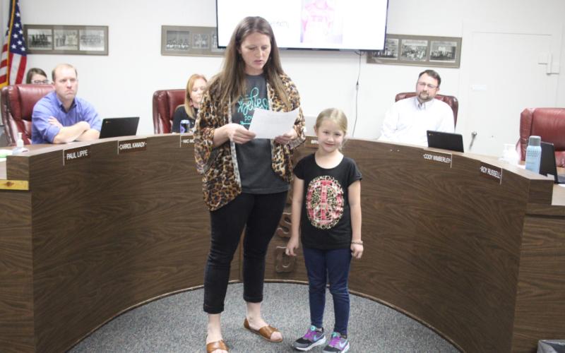 Langford presents BISD Board with check for $1,500