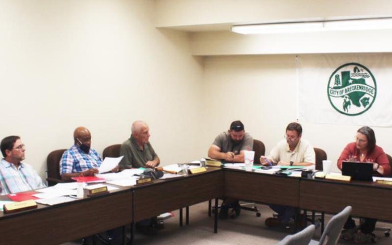 City to receive assistance from firm in locating new city manager; sets proposed property tax rate