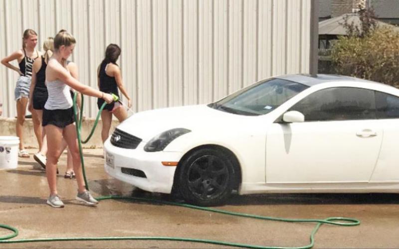 BHS cheerleaders raise over $600 during carwash
