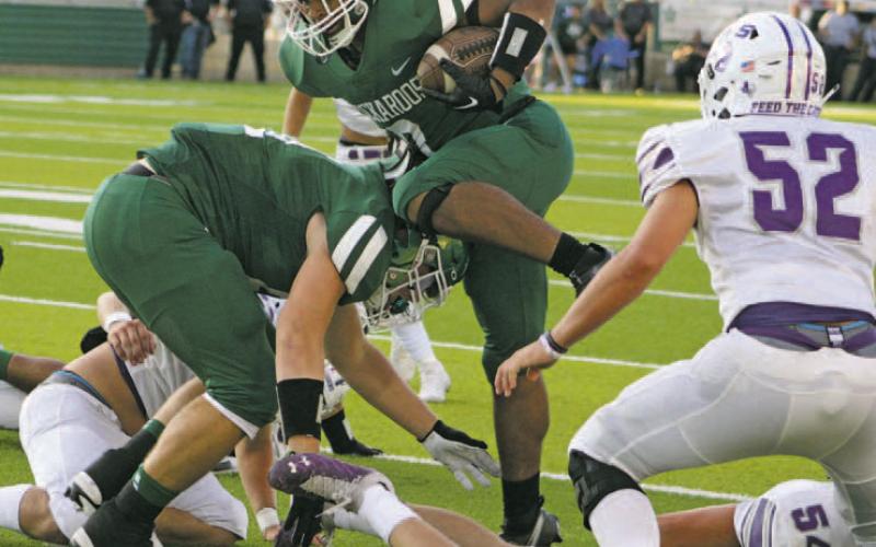 Bucks rout Tigers in season opener