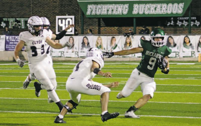 Breckenridge Buckaroos won their last regular season and Senior Night game Friday, Nov. 4, 5020, against the Clyde Bulldogs. Here, senior Anson Rodgers tries to avoid the Bulldogs defense. Photo/Stevie Watkins