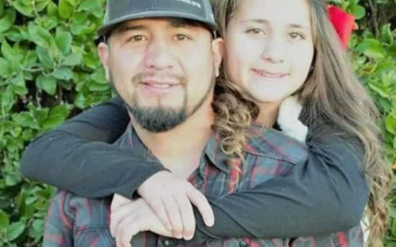 Raymond Baladez and his daughter Natalie Baladez pose for a photo. The All His Children Charity of Stephens County will honor its founder with a softball tournament at the Buckaroos Softball field on Saturday, June 27 at 9 a.m. Contributed photo