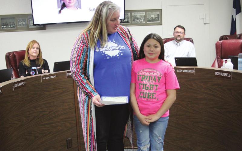 Langford presents BISD Board with check for $1,500