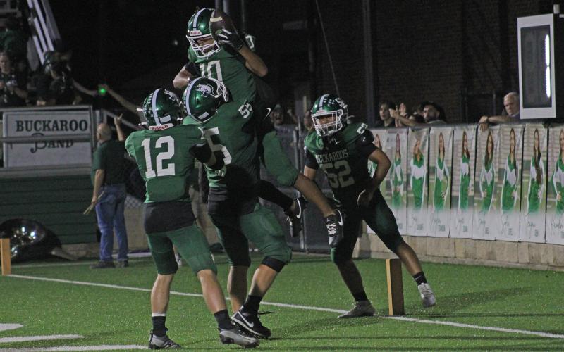 (Photo/Alex Kielar) Running back Jaime Cruz is lifted in the air by offensive lineman Brandon Niblett after Cruz ran it in for a touchdown against Cisco earlier this season. The Bucks open their district schedule up at Clyde this Friday, Oct. 10. 