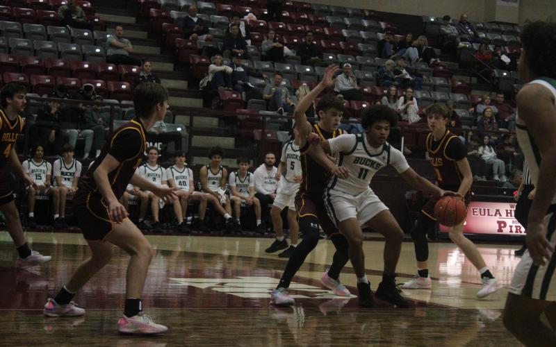 (Photo/Alex Kielar) Douglas White posts up in the paint against a Bells defender Monday, Dec. 29 to open up the Eula Holiday Classic. The Bucks went 2-2 in the tournament, closing it out with two wins. 