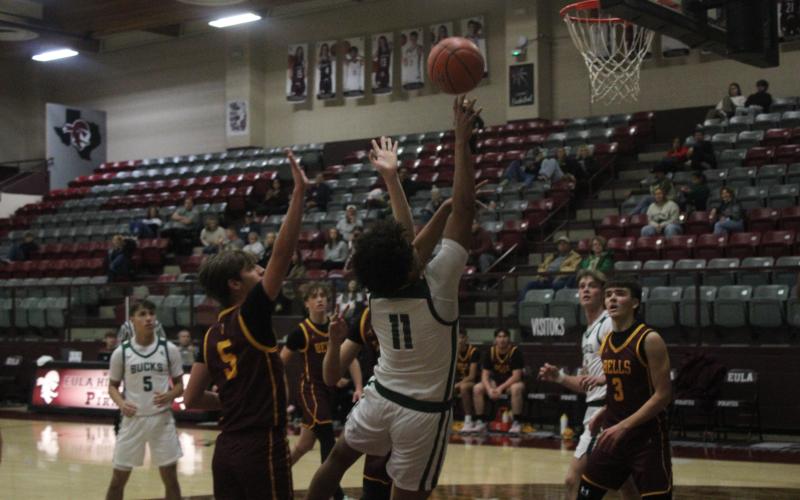 (Photo/Alex Kielar) Douglas White puts up a shot in the first half against Bells during the Eula Tournament in which the Bucks lost 52-34, Monday, Dec. 29. The Bucks went on to finish 2-2 overall in the tournament. 