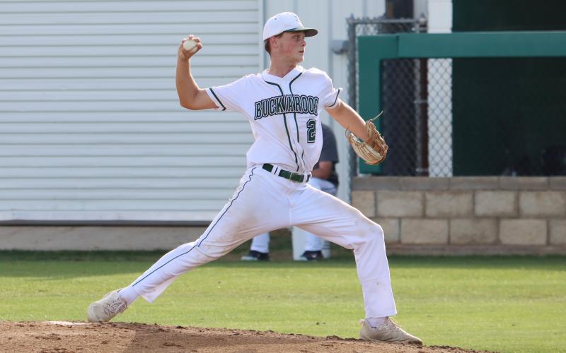 Hudson Woodward winds up a throw during a game earlier in the season for the Bucks. Woodward was honored with his team for their district performance. (Photo/Thomas Wallner)