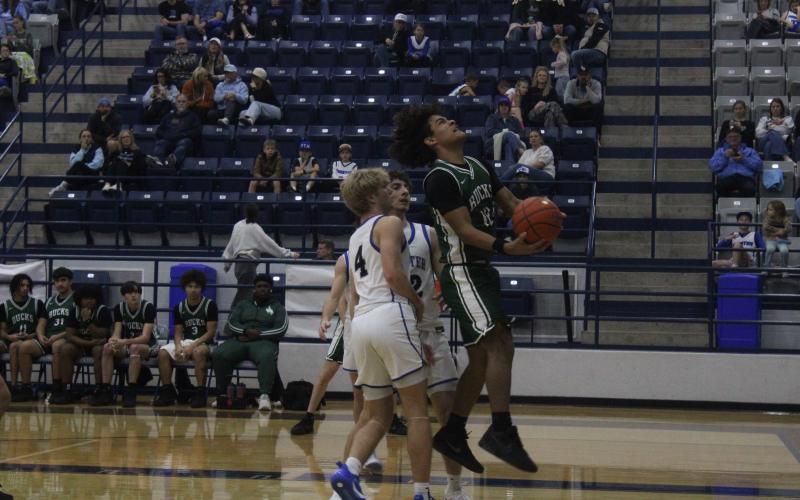 (Photo/Alex Kielar) Jaime Cruz goes up for a shot in the second half of the Buckaroos’ loss to the Peaster Greyhounds which was their first district loss Friday, Jan. 16. 