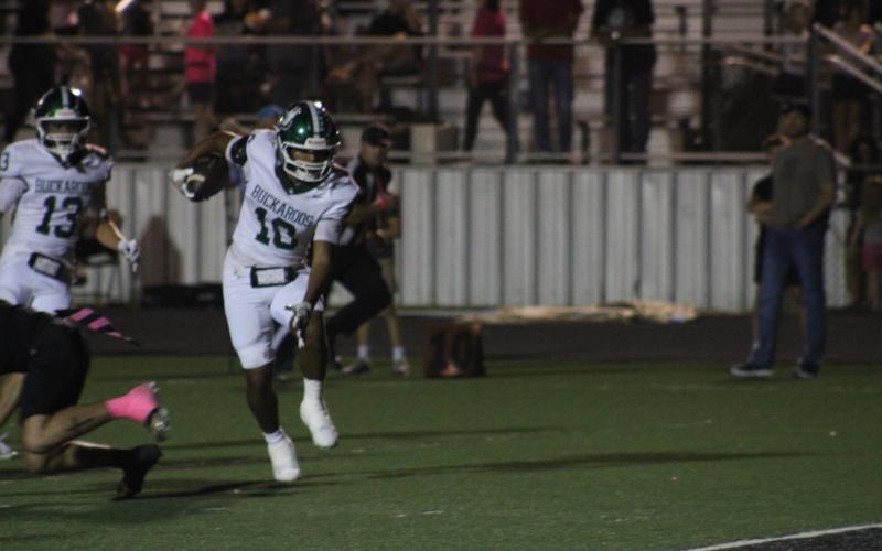 (Photo/Alex Kielar) Jaime Cruz makes a defender miss enroute to the end zone on a 14-yard touchdown run for the Bucks’ first score of the day against Clyde. 