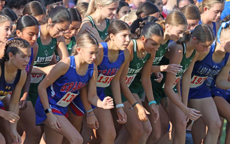 (Photo/Liam Bailey) The girl runners get set to get off the starting line of the 2-mile run at the Brownwood Invitational held Wednesday, Aug. 27. 