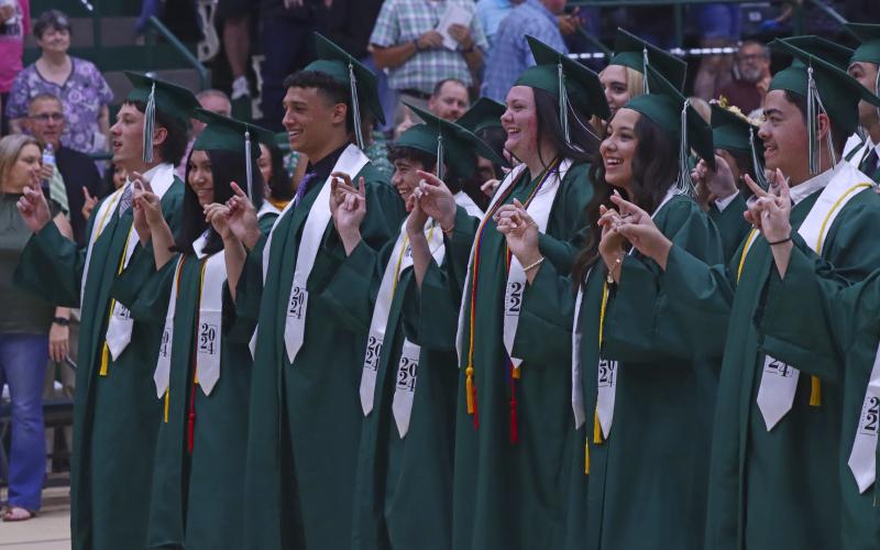 Seniors from Breckenridge High School sing the school song together following their graduation ceremony Friday, May 24 at Breckenridge ISD Athletics and Fine Arts Center. Photo/TC Gordon