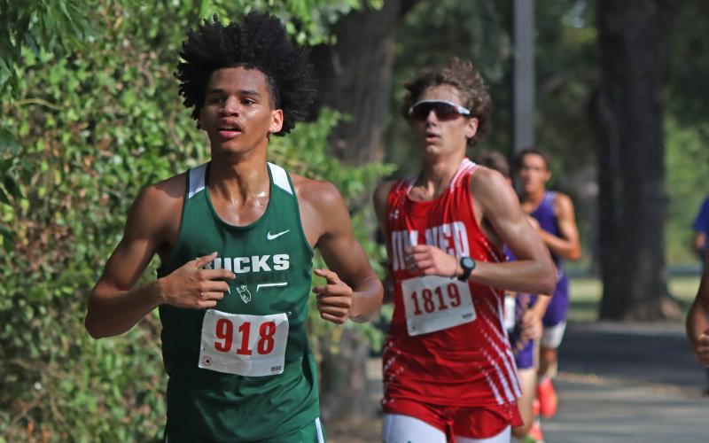 (Photo/Liam Bailey) Andrew White races in the three-mile run of the Brownwood Invitational in which he placed ninth overall to earn a top 20 medal Wednesday, Aug. 27. 