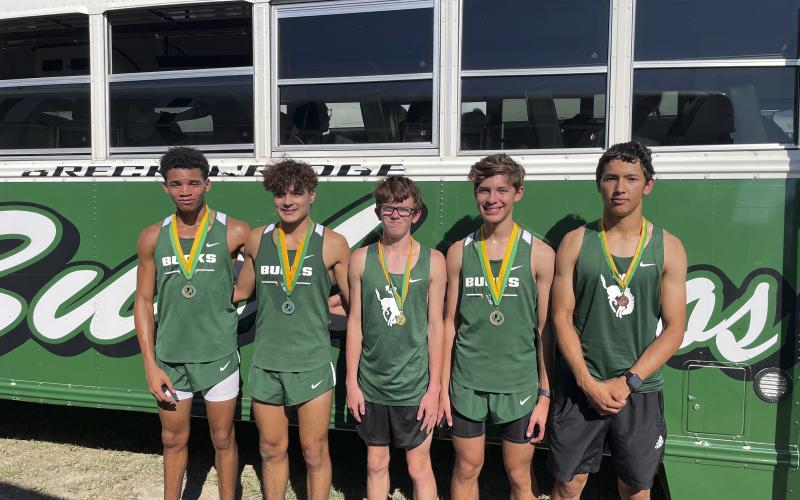 Chance Stewart, Adrian Saucedo, Andrew White, Kasen Ferguson and Angel Alvarado (not in order) each earned medals for their finished in the boys’ varsity and junior varsity races at the Dublin FCA cross country meet Wednesday, Sept. 20 at Dublin High School. Photo/Donny Funderburg