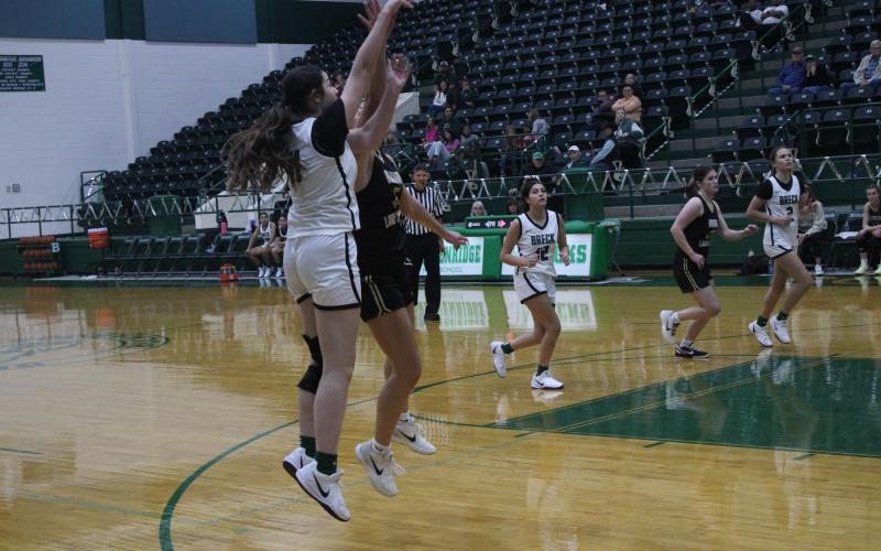 (Photo/Alex Kielar) Paisley Thibodeaux attempts a shot on the right side of the court during the first half of the Lady Bucks’ non-district home opening game Tuesday, Nov. 12 against the Gordon Lady Longhorns. 