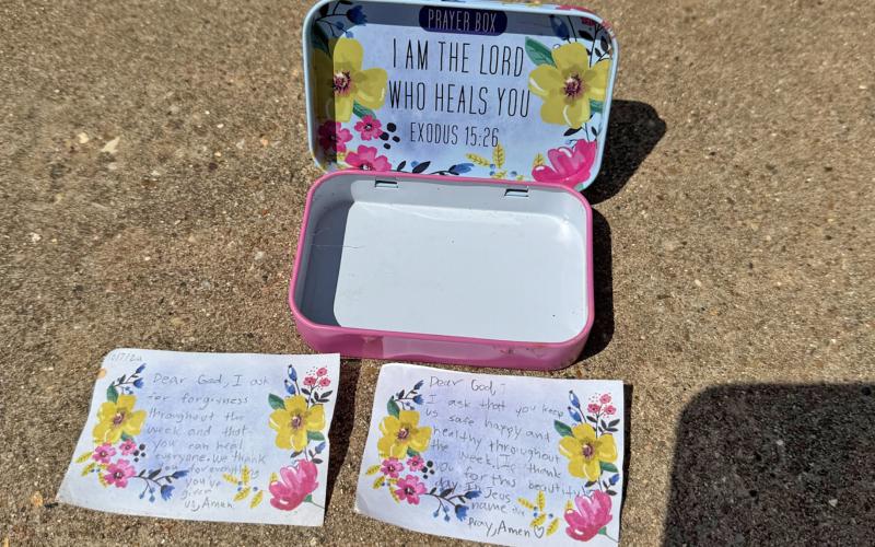 (Contributed Photo) One of the precious items that Milly Cate McClymond was able to recover from her trunk was a prayer box that she received from her aunt about a year ago. Inside the box were prayers for safety that she wrote last year. 