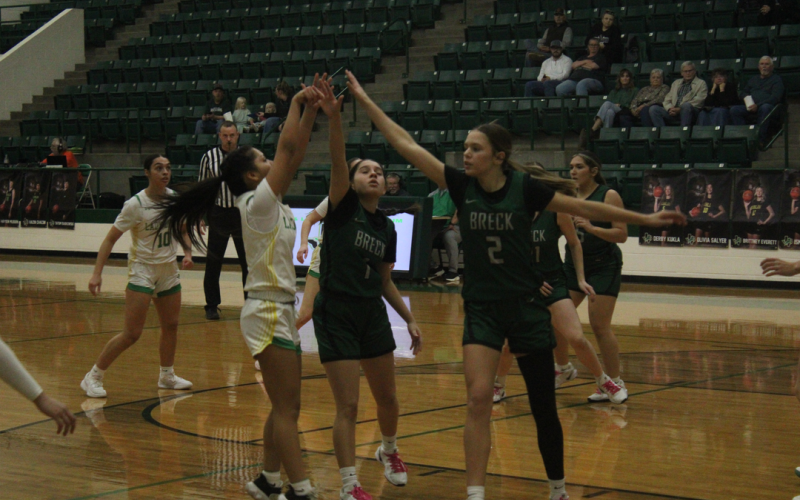 (Photo/Alex Kielar) LaKyla Bartley, right, and Neveah Johnson, middle, defend a Dublin shot attempt during the first half of the Lady Bucks’ 46-34 district road victory Friday, Jan. 9. 