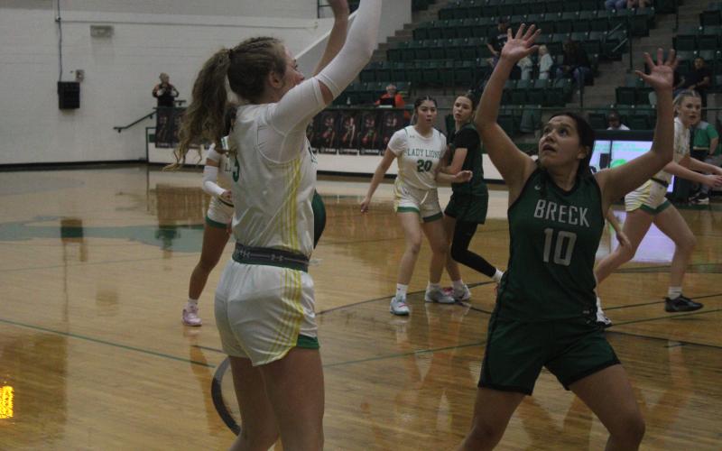 (Photo/Alex Kielar) Paisley Thibodeaux, who scored 10 points in the 46-34 road win, defends an attempted pass into the paint during the first half of the team’s first district win of the season. 