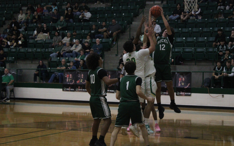 Photo/Alex Kielar) Ryan Waller snags a defensive rebound in the first half of the Bucks’ 58-37 win over the Dublin Lions on the road Friday, Jan. 9. 