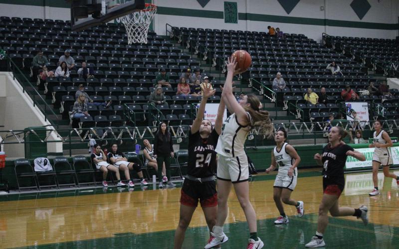 (Photo/Alex Kielar) Preslie Malcuit pulls up for a shot Monday, Nov. 24 in the Lady Bucks’ game against Olney. The Lady Bucks will be heading to Lipan High School in a couple of days to participate in the HD Howard Classic tournament. 