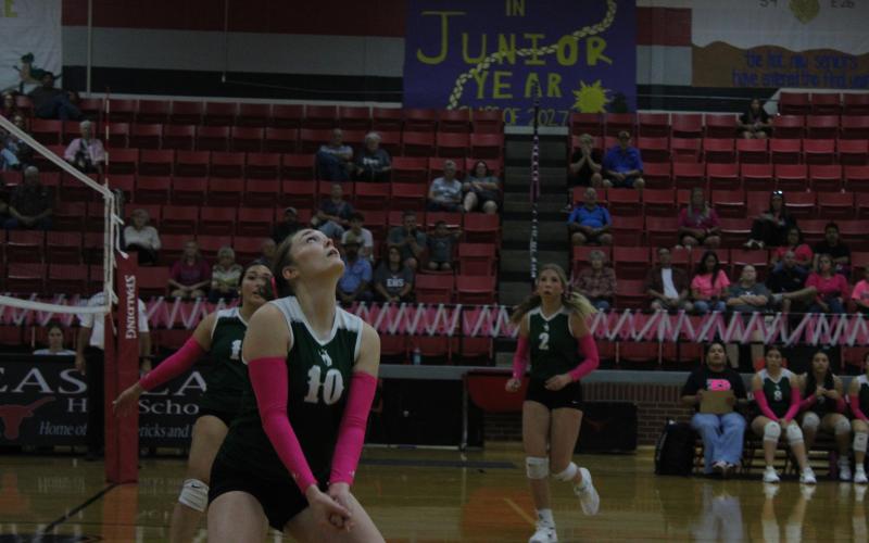 (Photo/Alex Kielar) Preslie Malcuit waits the ball to come down to bump it Friday, Oct. 10 against Eastland. 