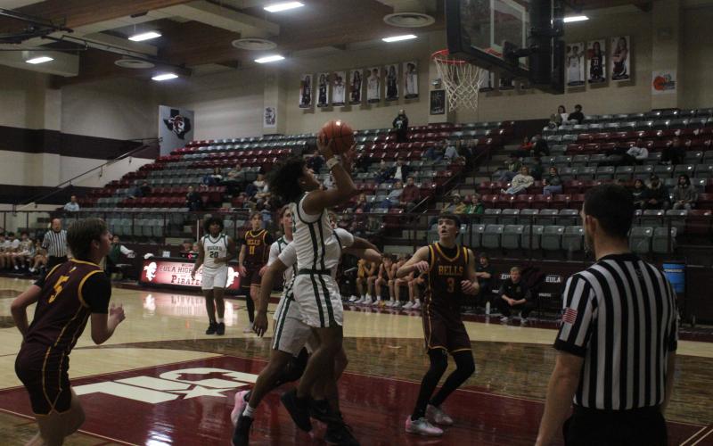 (Photo/Alex Kielar) Jamie Cruz goes up for a shot in the first half of the Bucks’ game against Bells to begin the Eula Holiday Classic, in which they lost their first two games and won their last two. 