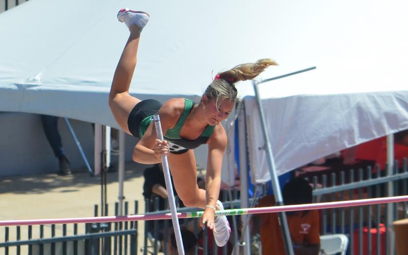 (Photo/Colton McWilliams) Kamden Tidwell clears the bar in the pole vault competition at the UIL State Track Meet. Tidwell finished in third place at the state competition.