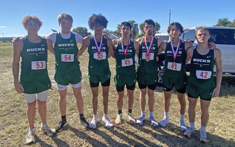 (Photo/Alex Kielar)  The Bucks cross country team, as well as the Lady Bucks, earned a third-place finish at the Hico Bluebonnet Invitational at the Bluebonnet Country Club. From left to right are Maliki Smith, Logan Thompson, Andrew White, Gabriel Garcia, Bodie Skiles, Agustin Byrd and Landon Elting. White, Garcia, Skiles and Byrd each earned medals as top 20 finishers. 