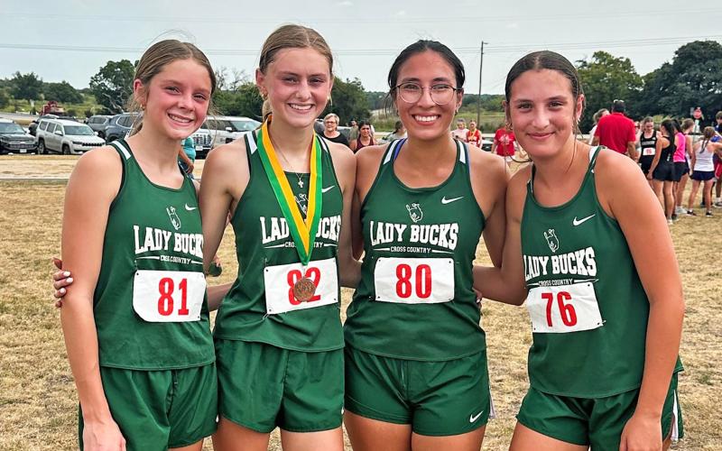 (Photo/Alex Kielar) The Lady Bucks placed third at the Dublin FCA invitational cross country meet Wednesday, Sept. 17. From left are Maylea Townson, Sayler Townson, Lizandra Rubio and Abby Nye. 