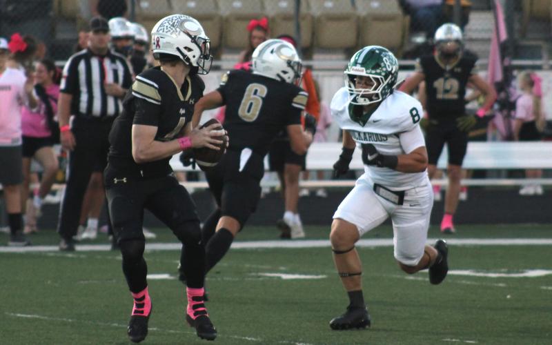 (Photo/Alex Kielar) Gunnar Pearce rushes after Clyde quarterback Devan Wright, who was tough to stop on scrambles for the Buckaroo defense. Pearce recorded three quarterback pressures, five total tackles and an interception in the game. 