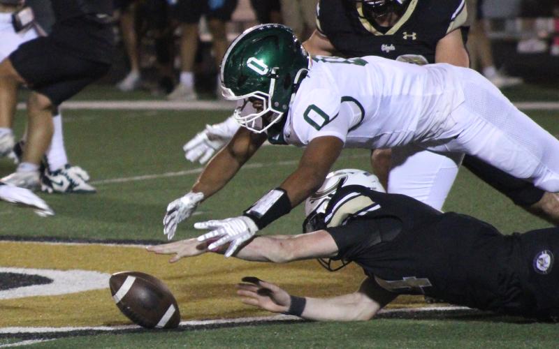 (Photo/Alex Kielar) Douglas White goes down to recover a Clyde fumble in the first quarter of the district opener Friday, Oct. 10 