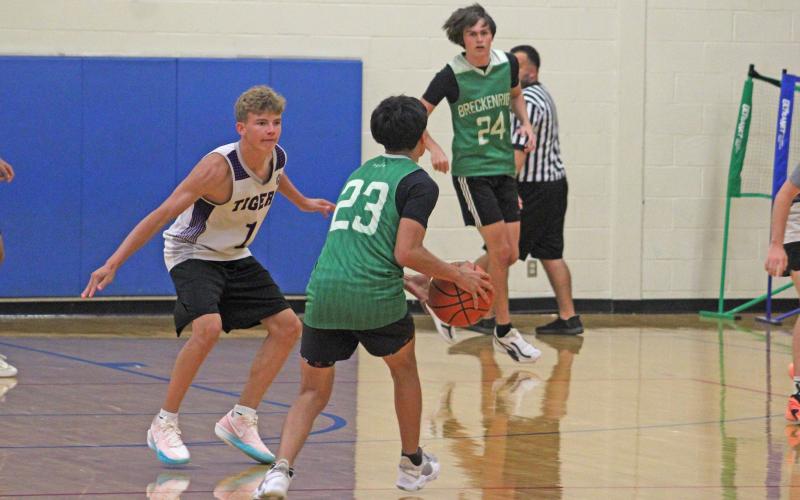 (Photo/Alex Havardansky) Luis Palacios dribbles up court and looks to pass to the corner against the Jacksboro Tigers as the Bucks competed in the first week of the Graham fall basketball league Monday, Sept. 22. 
