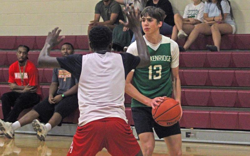 (Photo/Alex Havardansky) Bry Armstrong holds the basketball in the corner and looks to either shoot or pass against a Wichita Falls Christ Academy defender during the Bucks’ second game of the opening week of the Graham fall basketball league Monday, Sept. 22. 