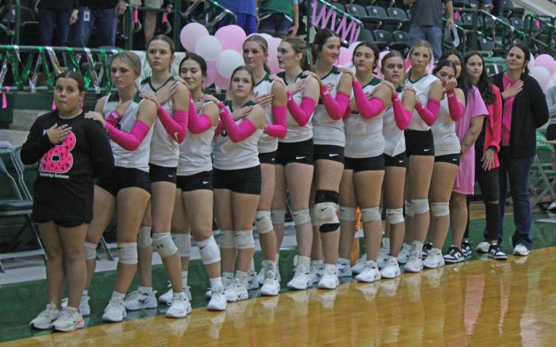 (Photo/Alex Kielar) The Lady Bucks stand during the national anthem before the Lady Bucks’ Senior Night victory over the Dublin Lady Lions. 
