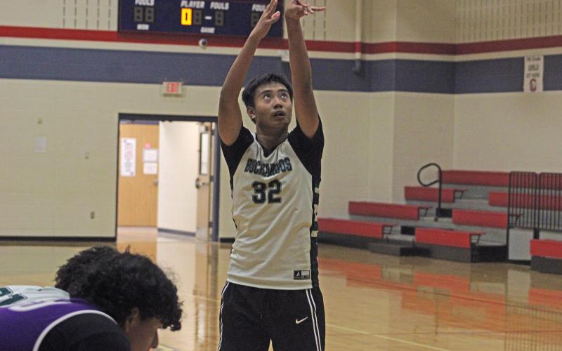 (Alex Harvadansky/Graham Leader) Artmund Malab attempts a free throw during the Bucks’ game against the Jacksboro Tigers in the third week of the Graham fall basketball league Monday, Oct. 6. 
