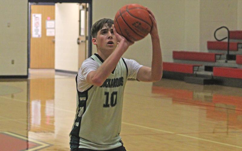(Alex Harvadansky/Graham Leader) Bry Armstrong attempts a free throw during the Bucks’ game against the Jacksboro Tigers in the third week of the Graham fall basketball league Monday, Oct. 6. 