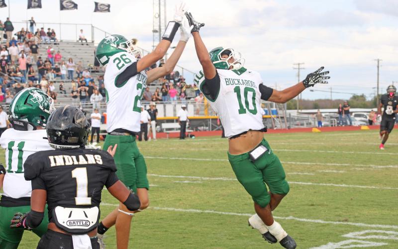 (Photo/Alex Kielar) With the Buckaroo sideline holding its collective breath, Jaime Cruz and Canyon Shirley knock down a Hail Mary pass on the final play of a thrilling victory for the Bucks over Comanche, 26-22. 