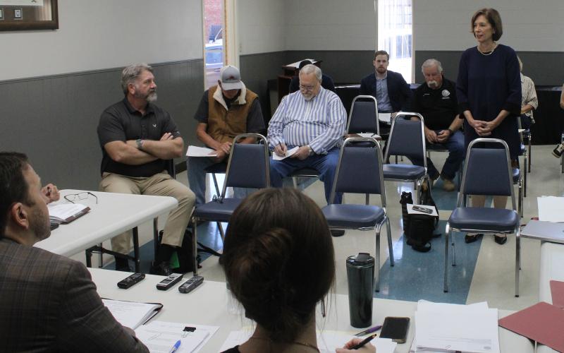 (Photo/Alex Kielar) The Stephens County Commissioners Court listens as Charlen Heydinger, President of the Texas PACE Authority, speaks about the purpose of the voluntary PACE program and how it would help Stephens County if implemented. 