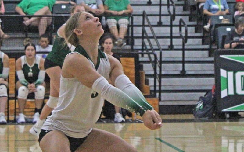 (Photo/Alex Kielar) Isabelle Biddison digs the ball during the Lady Bucks opening set of their non-district loss to Iowa Park on the road Tuesday, Aug, 19. Biddison recorded six successful bumps overall. 