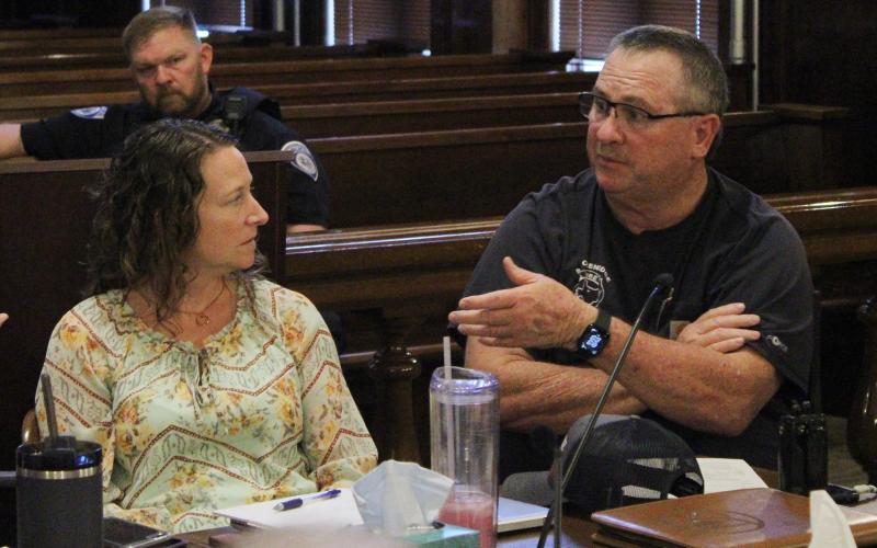 (Photo/Alex Kielar) Breckenridge Fire Chief Malcolm Bufkin, right, talks as various county entities meet to discuss an emergency food assistance plan Monday, Oct. 27 as SNAP benefits will be suspended at the end of the month, as Stephens County Treasurer Kelsey Cornwall looks on.