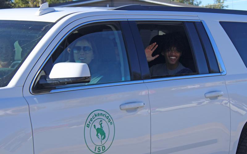 (Photo/Alex Kielar)  Andrew White waves to his Breckenridge classmates Thursday, Oct. 30, as he is sent off to the State Cross Country Championships. White placed 88th out of 151 runners in the Region 1-3A championship race Friday morning, Oct. 31. 