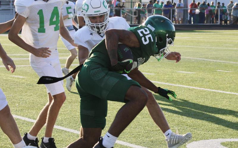 (Photo/Alex Kielar) Senior receiver Arrion Mathews refused to go down during the Bucks’ scrimmage Thursday, Aug. 21 at Wall, bouncing off defenders for long runs after screen passes. 