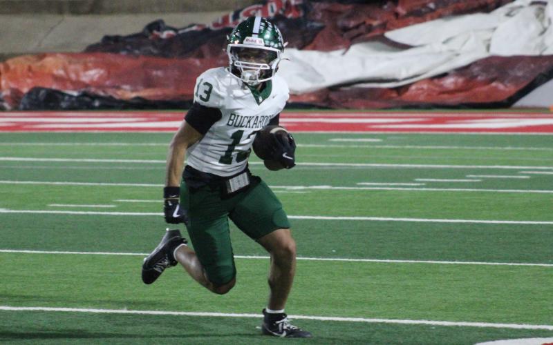 (Photo/Alex Kielar) Ryan Waller runs with the ball after a catch during the Bucks' loss at the Mustang Bowl in Sweetwater, Friday, Oct. 31. Waller recorded three catches for 60 yards during the game. 
