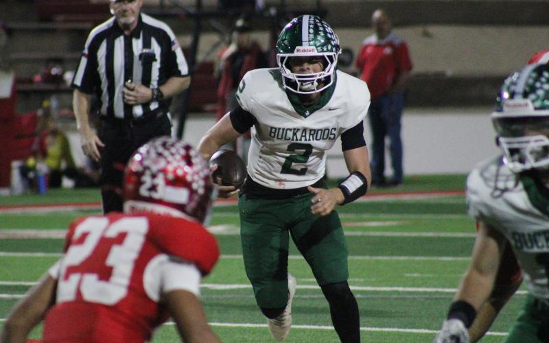 (Photo/Alex Kielar) Hudson Woodward comes in to play quarterback for Joseph Juneau in the second half while the Bucks are down big Friday, Oct. 31 against Sweetwater at the Mustang Bowl. 