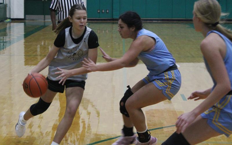 (Photo/Alex Kielar) LaKyla Bartley dribbles past a Huckabay defender during the Lady Bucks scrimmage to open their season Saturday, Nov. 1 at the Athletic and Fine Arts Center. 
