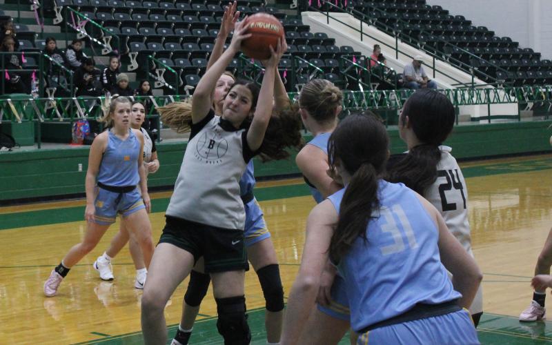 (Photo/Alex Kielar) Paisley Thibodeaux drives to the hoop against Huckabay in the paint during the Lady Bucks’ opening scrimmage Saturday, Nov. 1. 