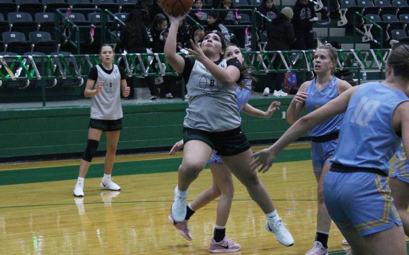 (Photo/Alex Kielar) nalia Palacios goes up for a layup in the Lady Bucks’ opening game of their scrimmage tournament to begin the basketball season Saturday, Nov. 1. 